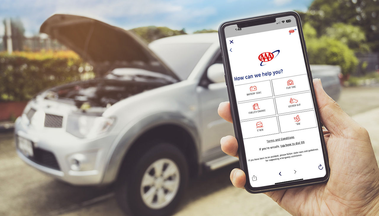 Man Phoning For Help with a broken down car